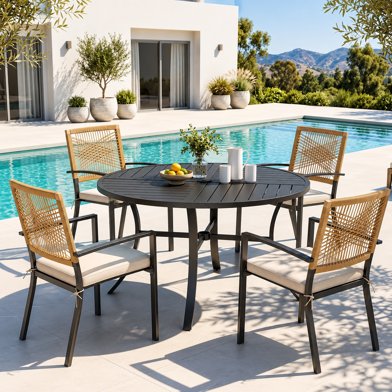 PHI VILLA 5 Pieces Patio Table and Chairs Set with round outdoor dining table and four cushioned chairs on a patio.