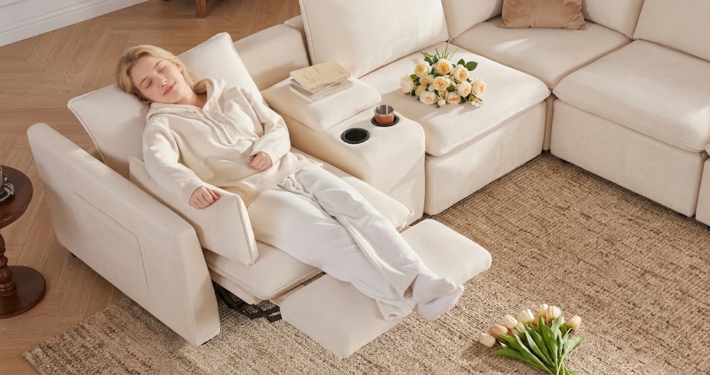 Beige power reclining sofa. Beige 6-seater power reclining sectional sofa set with center storage console in a modern living room.